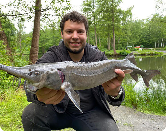 Trout Fisher Germany mit Stör